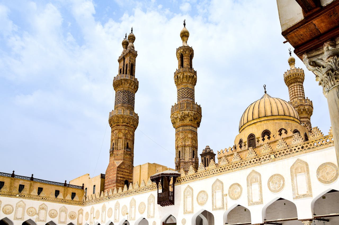 View of the historic Al-Azhar Mosque with its stunning domes and minarets in Cairo, Egypt.
